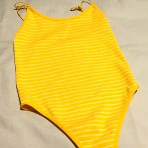 Yellow body suit
